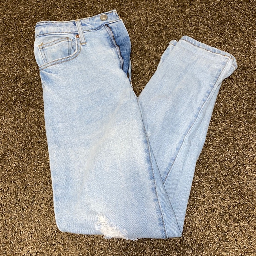 Ripped Light Blue Mom Jeans.